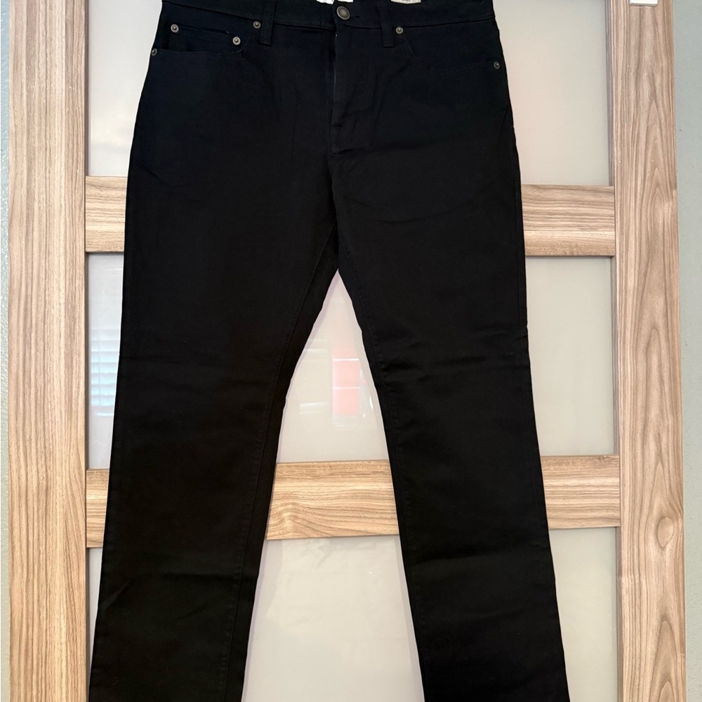 Black Slim Jeans with Sleek Silhouette and Traditional Texture